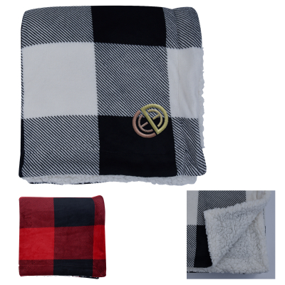 A throw blanket in black and white plaid.