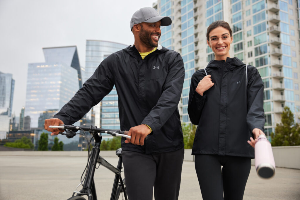 Two people in underarmor jackets