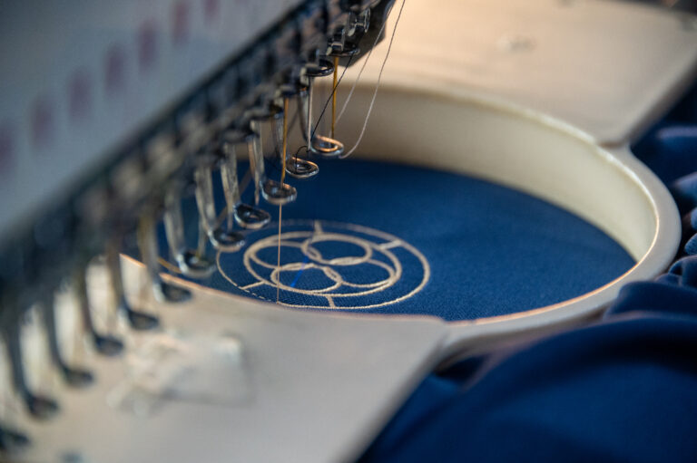 sewing machine creating custom apparel