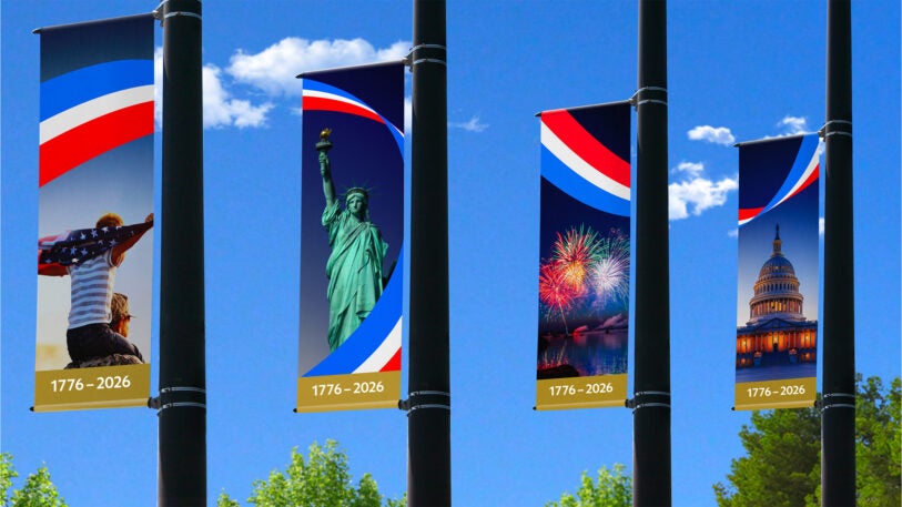 America 250 street pole banners displaying 1776-2026 for community campaign activation