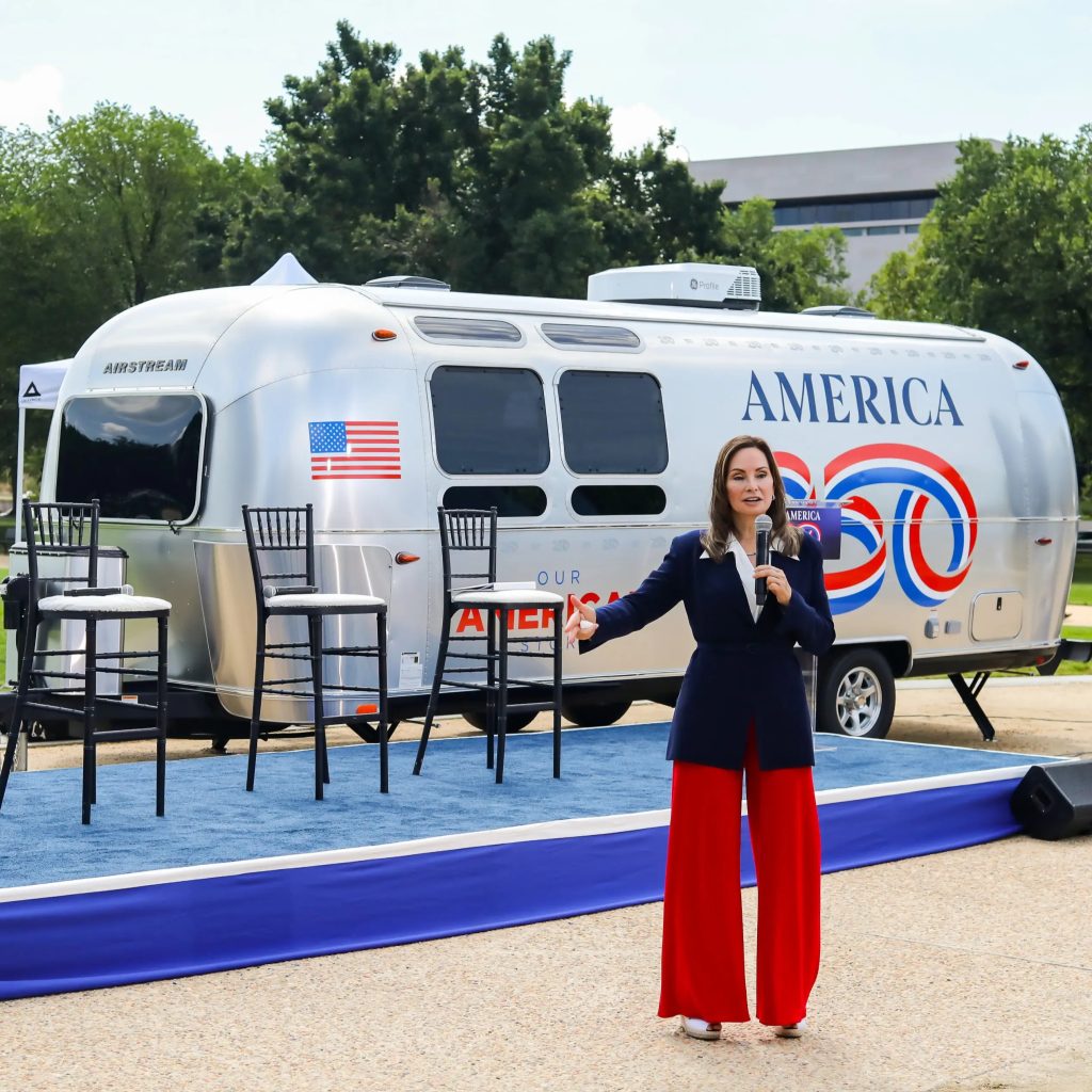 America 250 branded Airstream mobile activation unit with speaker at outdoor community event