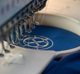 sewing machine creating custom apparel